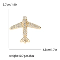 Elegant gold airplane brooch with crystal rhinestones, sized 4.3x3.7cm for suits - Gold