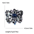 Vintage butterfly brooch with blue crystal and purple rhinestones, 4.5cm wide design - Blue