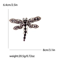 Vintage dragonfly brooch with purple and black rhinestones in gold finish, size 8x6.4cm - Purple