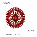 Luxurious red crystal brooch with a gold finish oval stone and marquise radiant design - Red