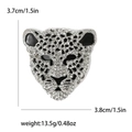 Broche léopard vintage en argent avec strass blancs et détails en émail noir - Argenté