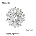 Eleganter silberner Blumen-Brosche mit Vintage-Kristallen und radialem Blüten-Design - Silber