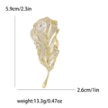 Eleganter Gold-Feder-Brosche mit Zirkonia-Mikropavé und tropfenförmigen Edelsteinen - Gold