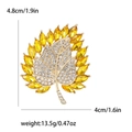Elegant gold maple leaf brooch with sparkling diamonds and yellow marquise gems - Yellow