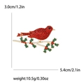 Elegant red bird brooch with green leaves and berries, gold base with rhinestones - Red (MM-BR-4228)