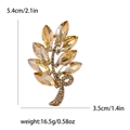 Broche espiga de trigo con cristales champán y acabado dorado, medida 5,4x3,5 cm - Champán