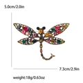 Spilla vintage a libellula con strass colorati e ali traforate, misura 7,3cm x 5,0cm - Colorato