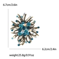 Detailweergave van vintage strass-broche met afmeting 6,7cm en gewicht van 25,8g - Teal