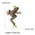 Retro frog brooch in golden alloy with pink and green rhinestones and size details - Pink