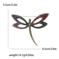Vintage dragonfly brooch with colorful rhinestones in 6.5cm width on white background - Colorful