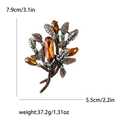 Broche de flor vintage con diamantes de imitación ámbar y medidas de tamaño - Marrón