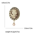 Spilla ritratto vintage dorata con bordo in pizzo e ciondolo a perla da donna - Oro