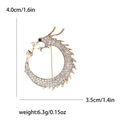 Detail showing the 4.0cm height and 3.5cm width dimensions of this dragon brooch - Gold