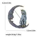Fashionable moon cat brooch with blue rhinestones and dimensions showing height and weight - Blue