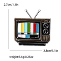 Classic retro television enamel pin with colorful screen bars and metallic antenna - Silver Square Style