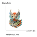 Detailed view showing the owl brooch dimensions of 3.3cm by 2.5cm and weight details - Colorful