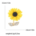 Fashionable enamel daisy brooch with yellow petals and crystal leaves, 3.2cm x 2.6cm - Yellow