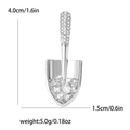 Détail d'une broche pelle argentée avec zircons incluant les dimensions et le poids exacts - Argenté