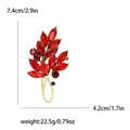 Dimensions de la broche feuille en cristal rouge de 7,4cm de long et 4,2cm de large - Rouge