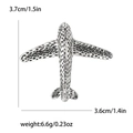 Detailed view of silver aircraft brooch dimensions and textured alloy finish - Silver