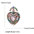 Detailed macro view showing dimensions and colorful rhinestones of the heart brooch - Pink