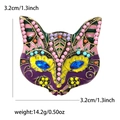 Detail view of fox mask brooch with colorful enamel and sparkling rhinestones - Purple