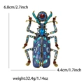 Enamel and rhinestone beetle brooch with vintage gold base and blue wings, 6.8cm height - Blue