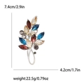 Broche feuille argentée avec strass colorés, dimensions de 7,4 cm sur 4,2 cm - Coloré