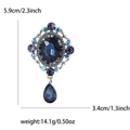 Spilla barocca vintage con pietra ovale blu intenso e ciondolo a goccia elegante - Blu