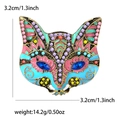 Exquisite fox mask brooch pin with colorful rhinestones and enamel in a golden finish - Blue