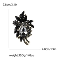 Vintage-Blumenbrosche aus Goldlegierung mit schwarzen Strasssteinen und Quasten, 7.8 cm - Black