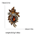 Amber crystal bauhinia brooch with marquise brown rhinestones in gold finish, 7.8x4.8cm - Brown