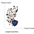 Elegant branch brooch with blue crystals and measurement specs on a white backdrop - Blue