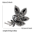Broche grande de hoja plateada con cristales negros que mide 8,6 por 10,3 cm - Negro (MM-BR-4440)