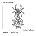 Silver alloy spider and web brooch with detailed metallic texture on white background - Black