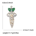 Spilla corona teschio spada con strass colorati misura 6,0 cm per 2,7 cm - Verde