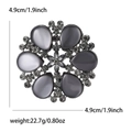 Broche de flor vintage con piedras ojo de gato grises y cristales, diámetro 4.9cm - Plateado