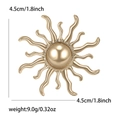 Spilla a forma di sole in lega dorata con perla centrale e raggi ondulati, 4,5 cm - Oro