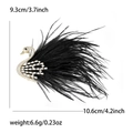 Elegant swan brooch in gold copper with white zircons and black feather details - Black