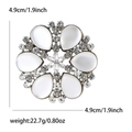 Elegante broche de copo de nieve dorado con piedras ojo de gato y diamantes, 4,9 cm - Dorado