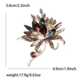 Vintage floral crystal brooch with colorful rhinestones on a golden alloy base - Medium Purple