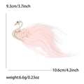 Elegant swan brooch featuring gold metal, sparkling crystals, and soft pink feathers - Pink