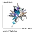 Elegant silver flower brooch with multi-color teardrop crystals and measurement details - Blue