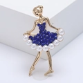 Elegant gold dancing girl brooch with navy blue rhinestones and white pearls detail - Blue