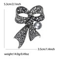 Spilla vintage a fiocco con strass grigio scuro e ciondolo di perla raffinata - Nero (MM-BR-4853-BK)