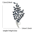Silver alloy willow branch brooch with blue gems, white crystals and pearl detail - Blue