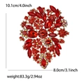 Detailed size view of a large vintage red crystal brooch with golden alloy setting - Red