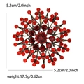 Elegante Bronze-Sonnenblumenbrosche mit roten Strasssteinen und zentralem Edelstein - Rot