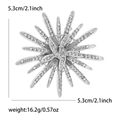 Silver sunflower brooch with rhinestones showing 5.3cm diameter and 16.2g weight details - Silver