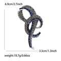 Detail showing vintage ribbon brooch dimensions 6.9cm height with blue rhinestones - Blue